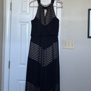Fully lined black maxi with chevron detailing. Sleeveless. Size 16